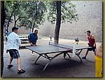 z playing tennis in the park.JPG