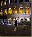 Colosseum at night Sue shows off.JPG