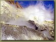 inside the crater - steaming sulfur.JPG