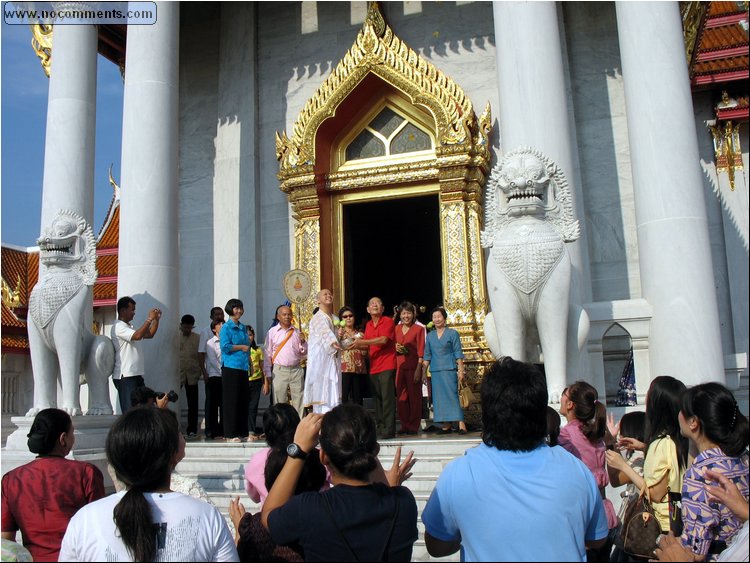 Marble Temple Good luck 5Bt coins thrown to ordination crowd 2.jpg