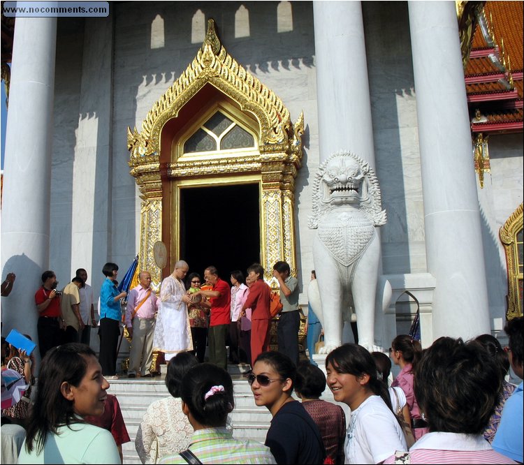 Marble Temple Good luck 5Bt coins thrown to ordination crowd.jpg