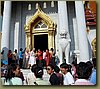 Marble Temple Good luck 5Bt coins thrown to ordination crowd.jpg