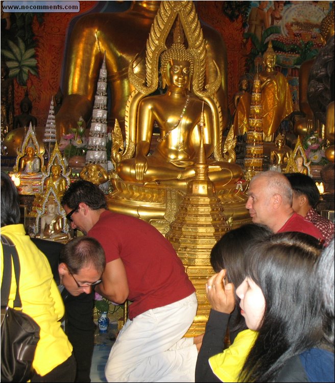 Wat Phrathat Doi Suthep - kneeling before Buddha 1.jpg